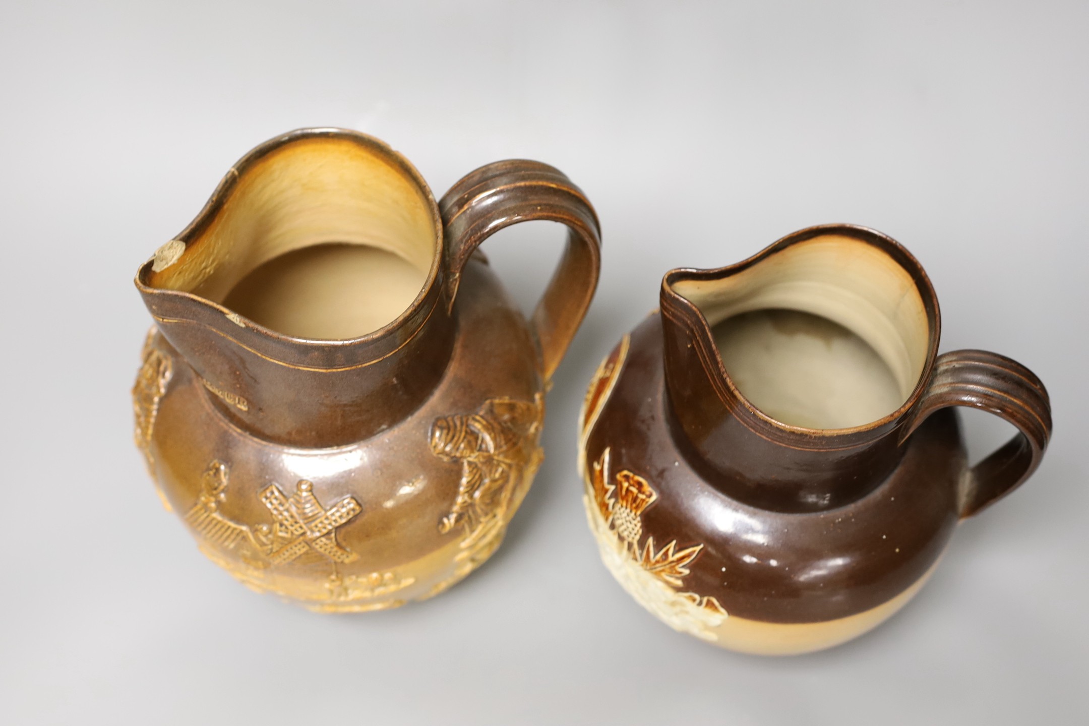 A Doulton Lambeth for John Mortlock & Co. commemorative stoneware jug and another stoneware jug impressed ‘Septimus Shearmur 1878’, tallest 22cm